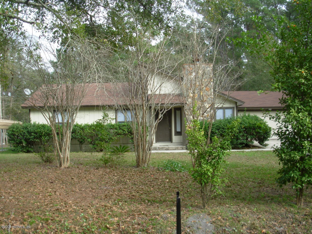2107 Cornell Road Middleburg, FL 32068 - Photo 2 of 11 a view of a house with a tree in front of it