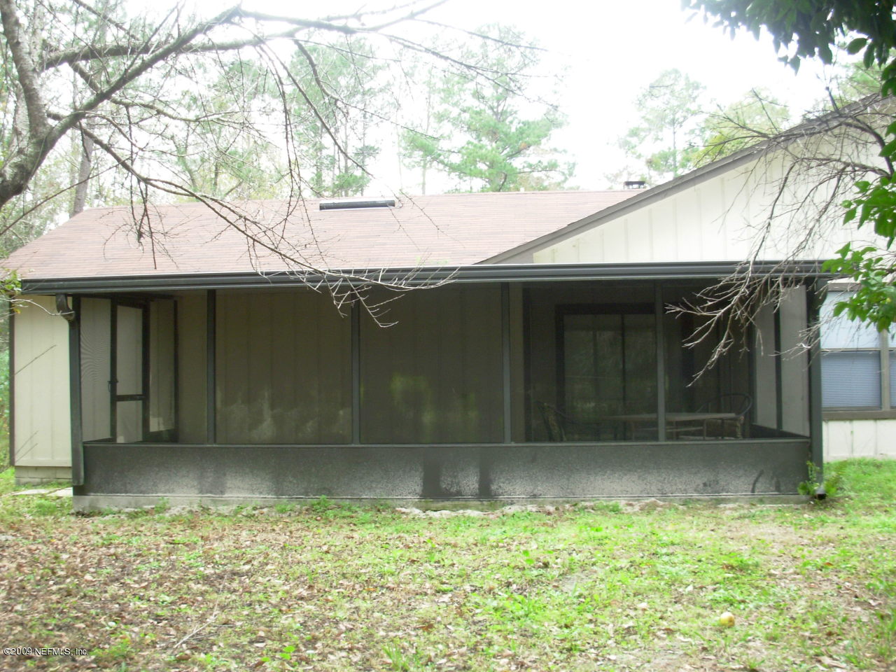2107 Cornell Road Middleburg, FL 32068 - Photo 9 of 11 a house with a tree in front of it