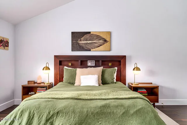 a spacious bathroom with a sink and a mirror