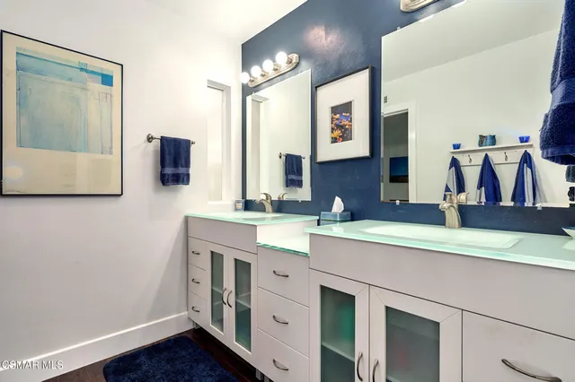 a workspace with furniture and wooden floor