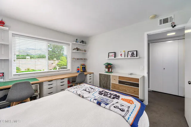 a view of a house with sitting area and furniture