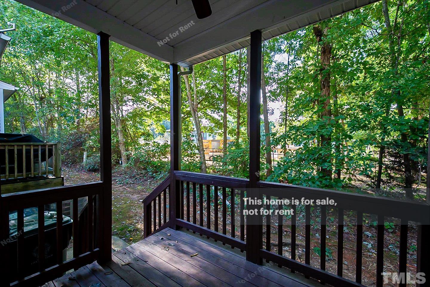 2625 Broad Oaks Place Raleigh, NC 27603 - Photo 13 of 14 a balcony with wooden floor and outdoor space
