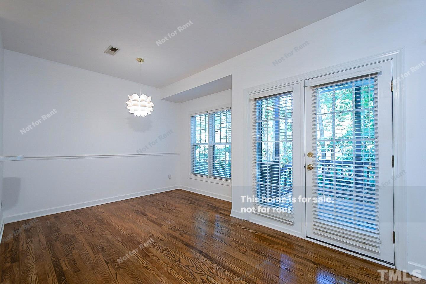 2625 Broad Oaks Place Raleigh, NC 27603 - Photo 8 of 14 a view of livingroom with hardwood floor and window