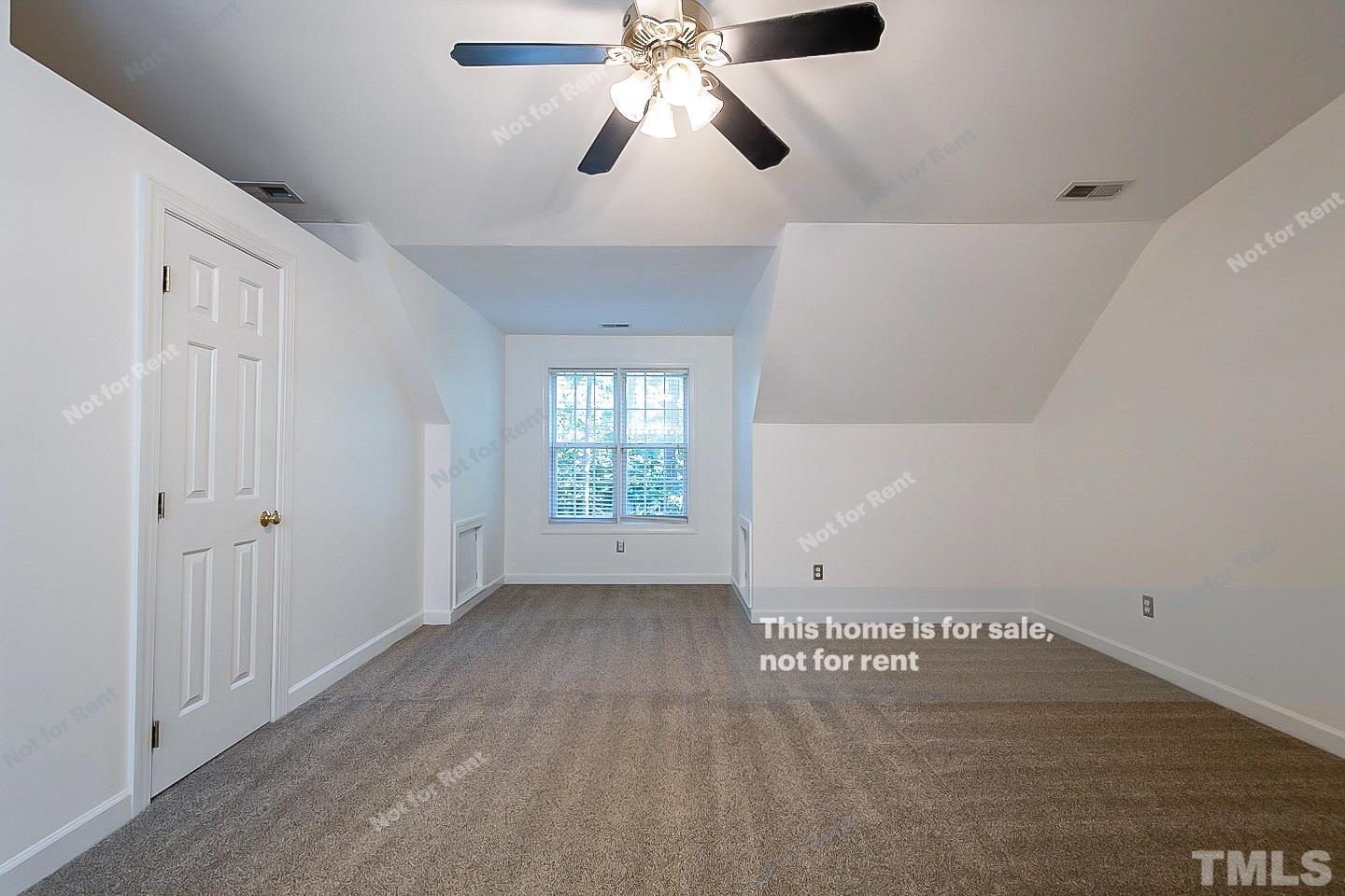 2625 Broad Oaks Place Raleigh, NC 27603 - Photo 9 of 14 a view of an empty room with a window
