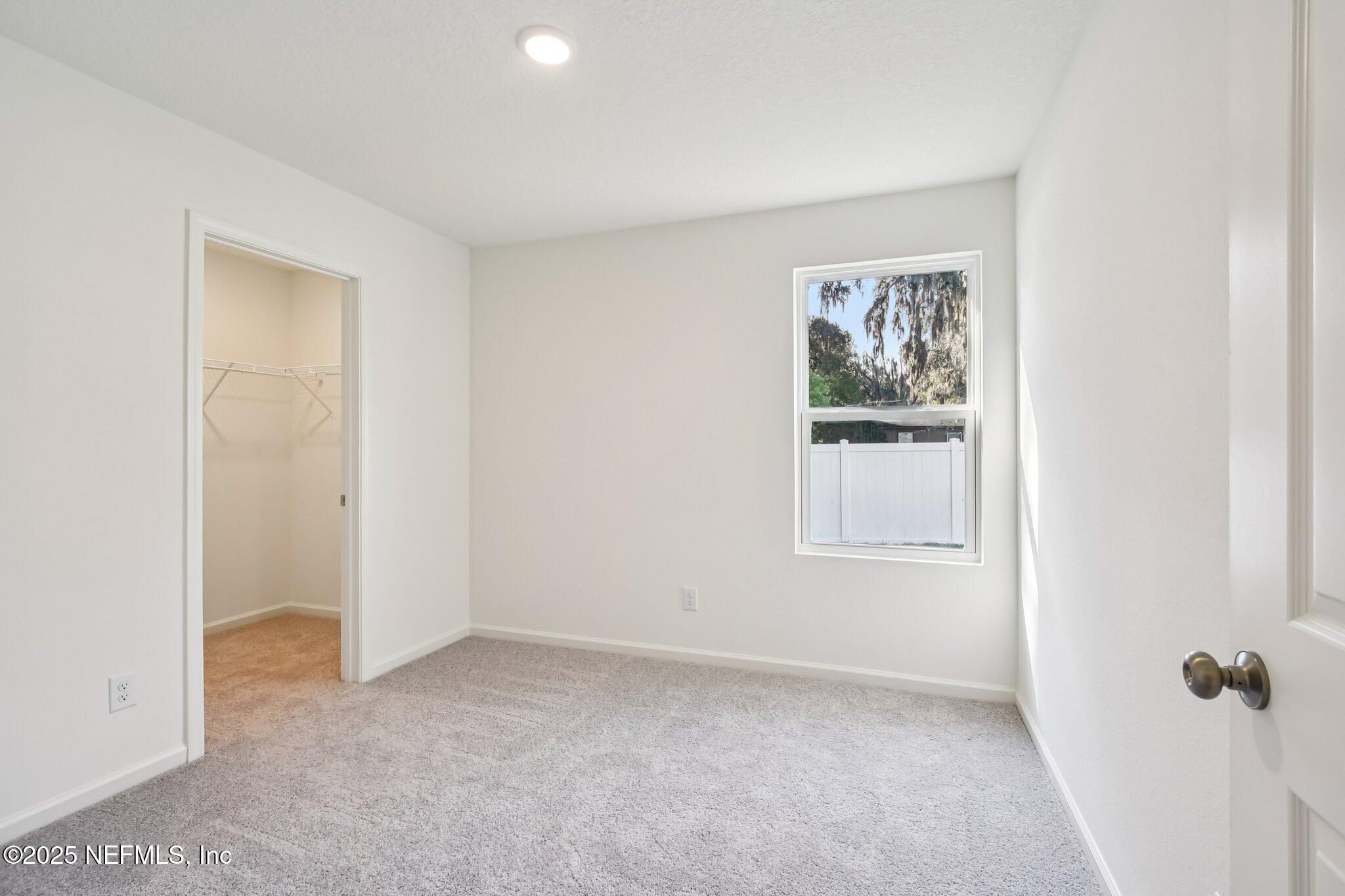 3407 Mildred Way Jacksonville, FL 32254 - Photo 25 of 38 an empty room with windows and closet