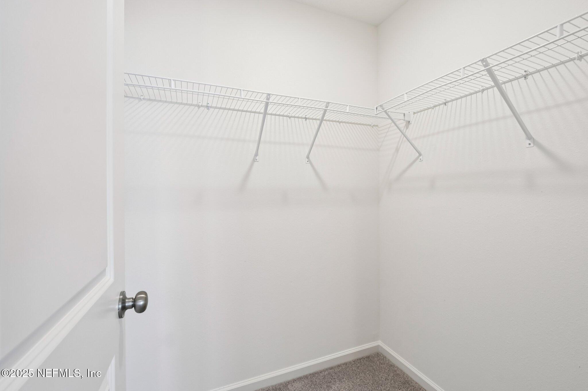 3407 Mildred Way Jacksonville, FL 32254 - Photo 27 of 38 a view of a room with racks on the wall