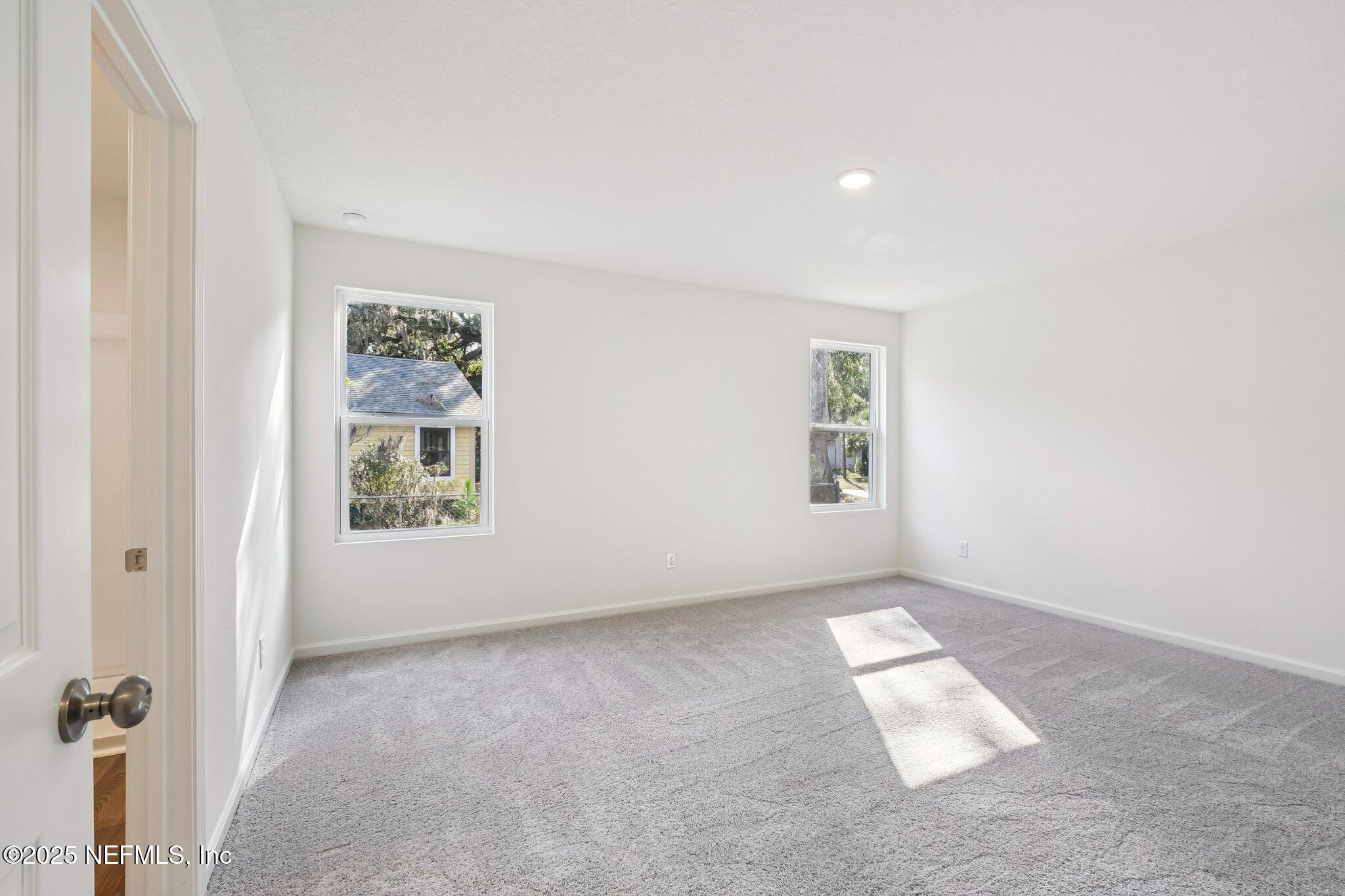 3407 Mildred Way Jacksonville, FL 32254 - Photo 31 of 38 an empty room with windows