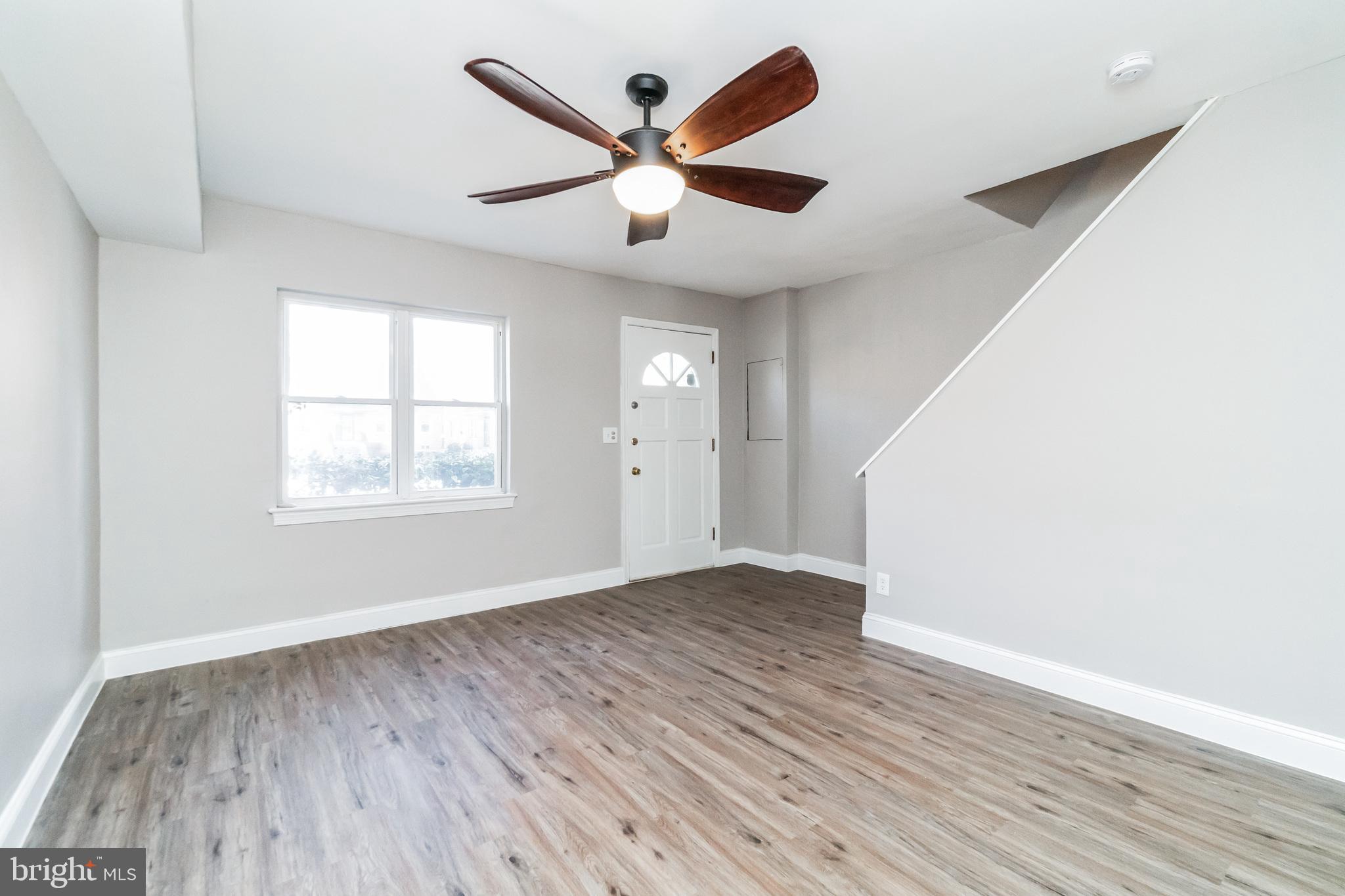 1515 First Street Southwest Washington, DC 20024 - Photo 2 of 37 wooden floor in an empty room with a window