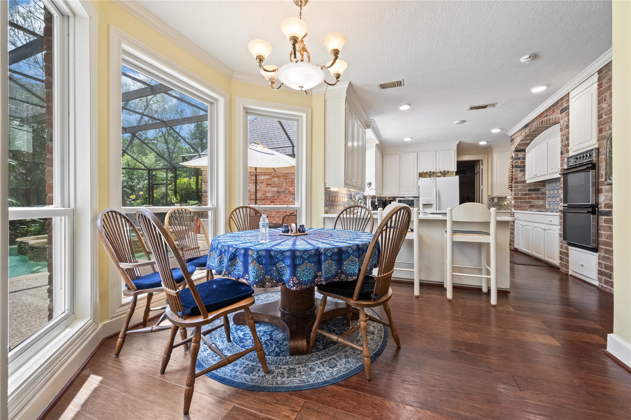 7639 Post Bridge Road Spring, TX 77389 - Photo 10 of 42 a view of a dining room with furniture window and wooden floor