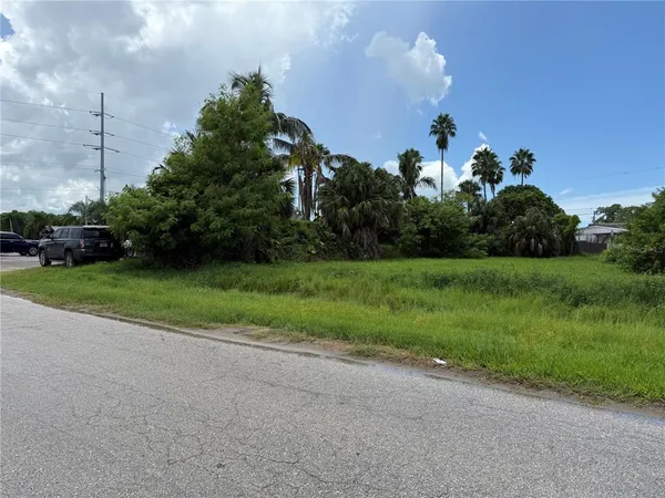 a view of a golf course with a garden