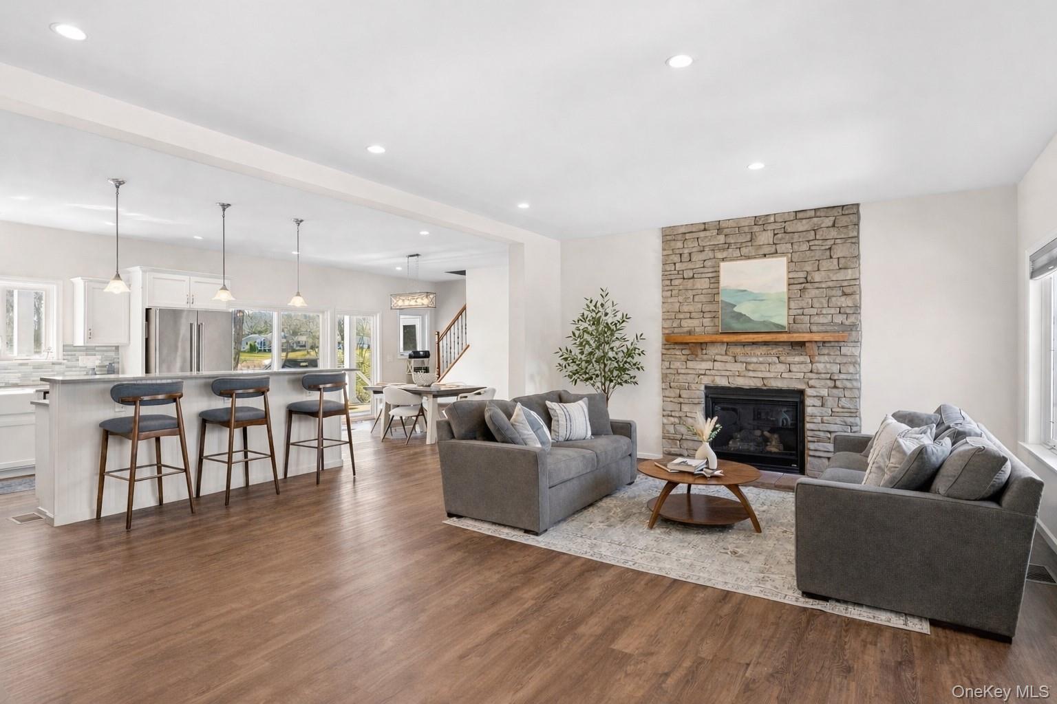 2280 Deep Hole Drive Mattituck, NY 11952 - Photo 2 of 35 Open and inviting living spaces designed to capture water views and coastal breezes