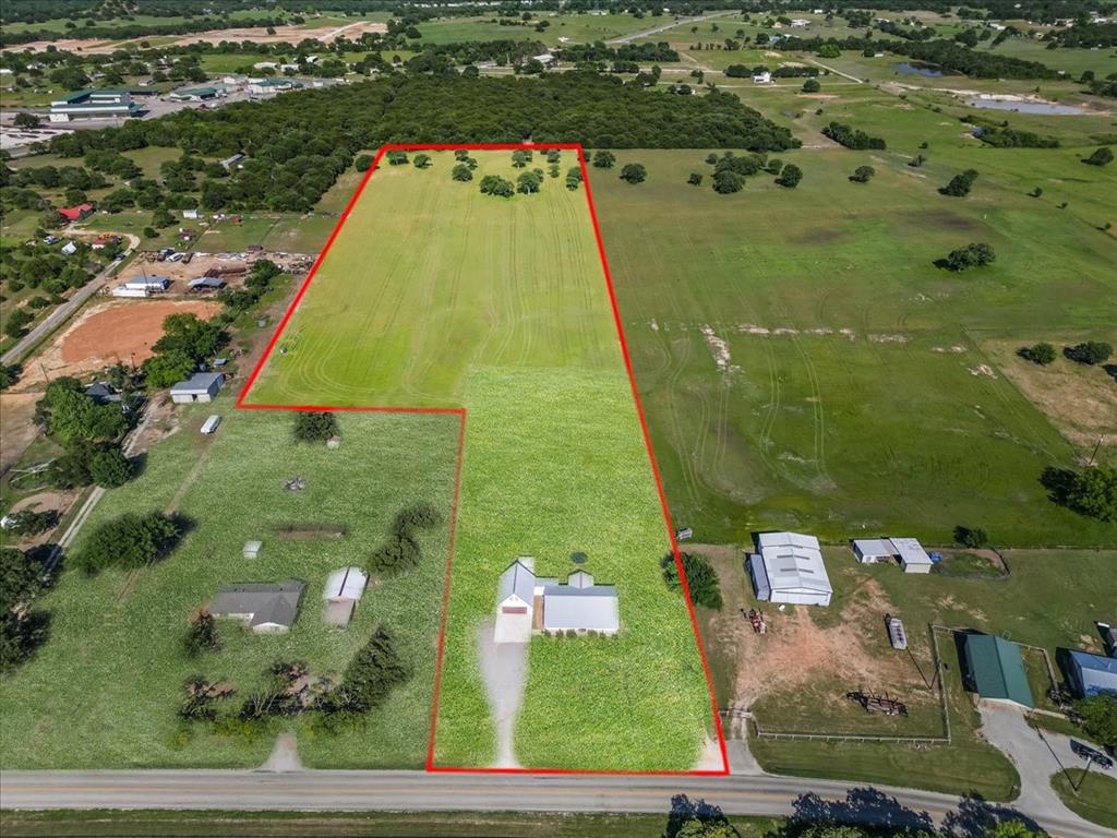 2250 Poolville Cut Off Road Springtown, TX 76082 - Photo 2 of 22 an aerial view of residential houses with outdoor space