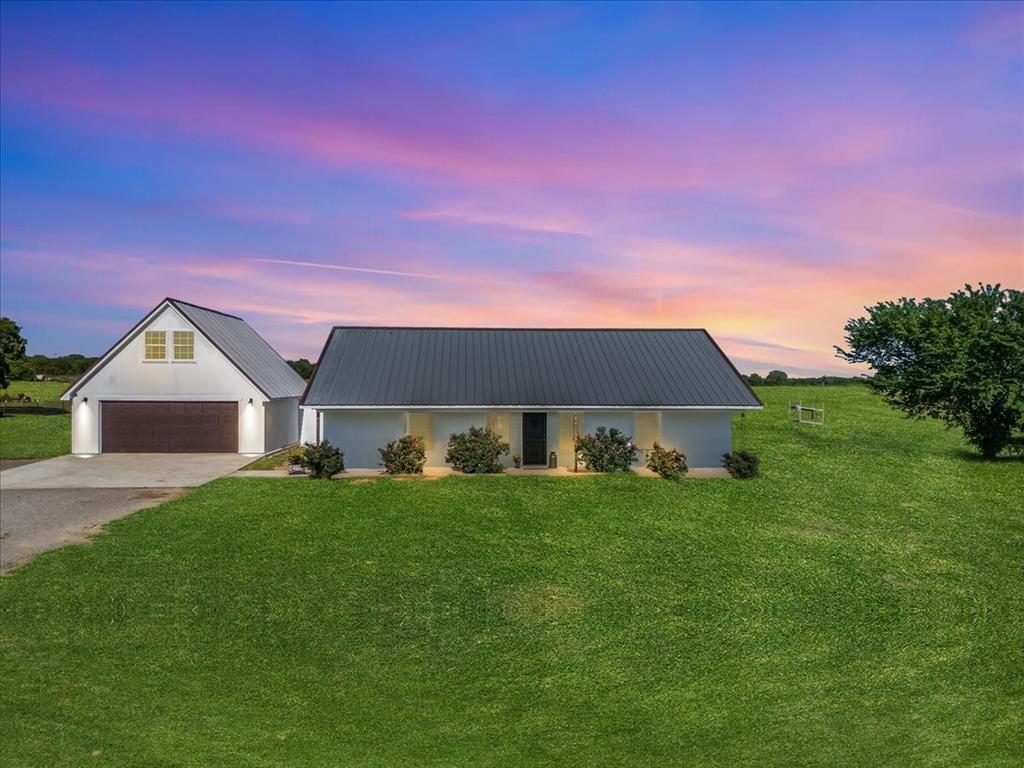 2250 Poolville Cut Off Road Springtown, TX 76082 - Photo 21 of 22 a view of a house with a big yard