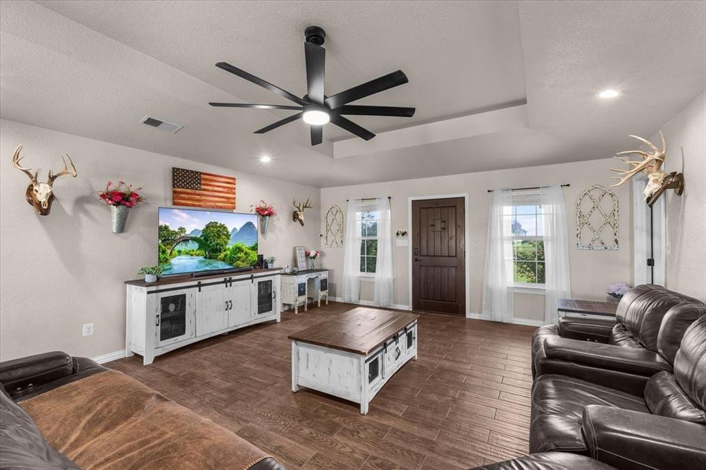 2250 Poolville Cut Off Road Springtown, TX 76082 - Photo 4 of 22 a living room with stainless steel appliances furniture and a window