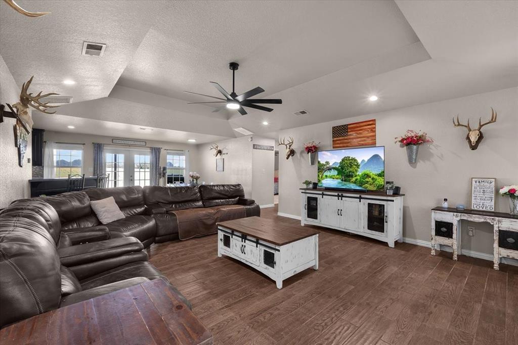 2250 Poolville Cut Off Road Springtown, TX 76082 - Photo 5 of 22 a living room with furniture and a large window