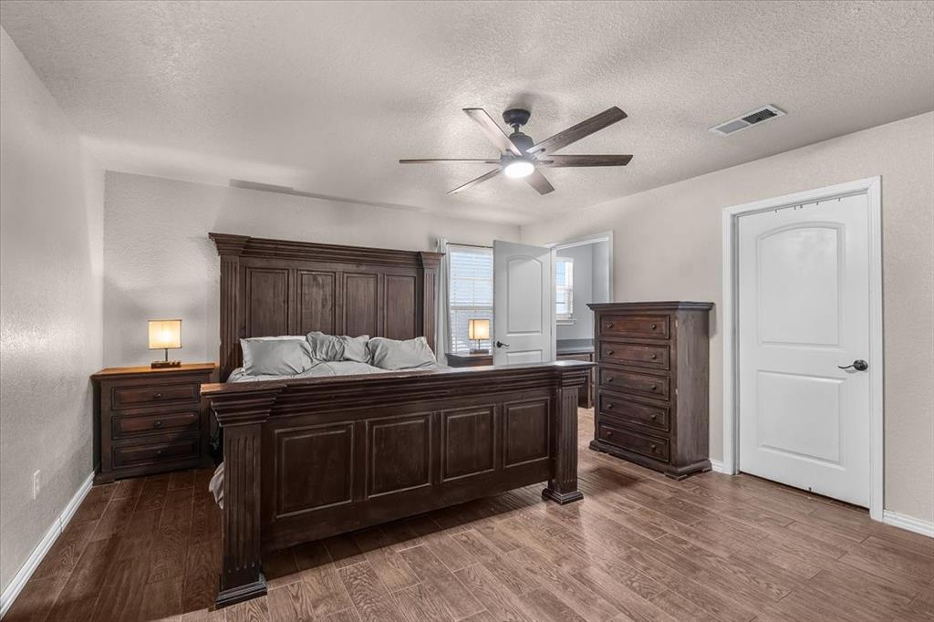 2250 Poolville Cut Off Road Springtown, TX 76082 - Photo 9 of 22 a kitchen with stainless steel appliances granite countertop a sink and cabinets