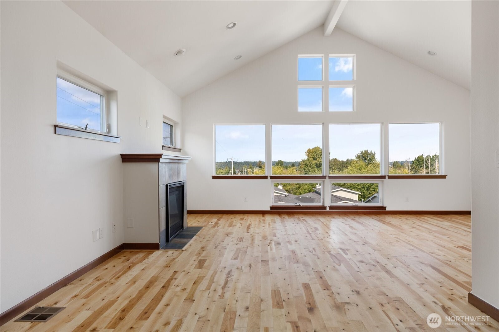 2119 20th Street Anacortes, WA 98221 - Photo 12 of 38 wooden floor in an empty room with a window