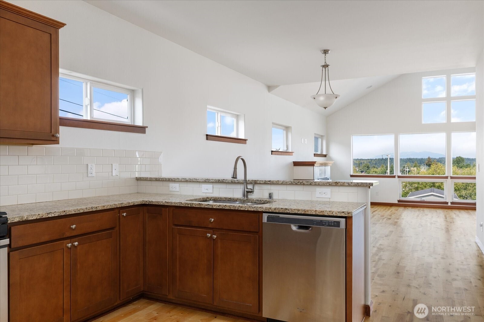 2119 20th Street Anacortes, WA 98221 - Photo 15 of 38 a kitchen with a sink and cabinets