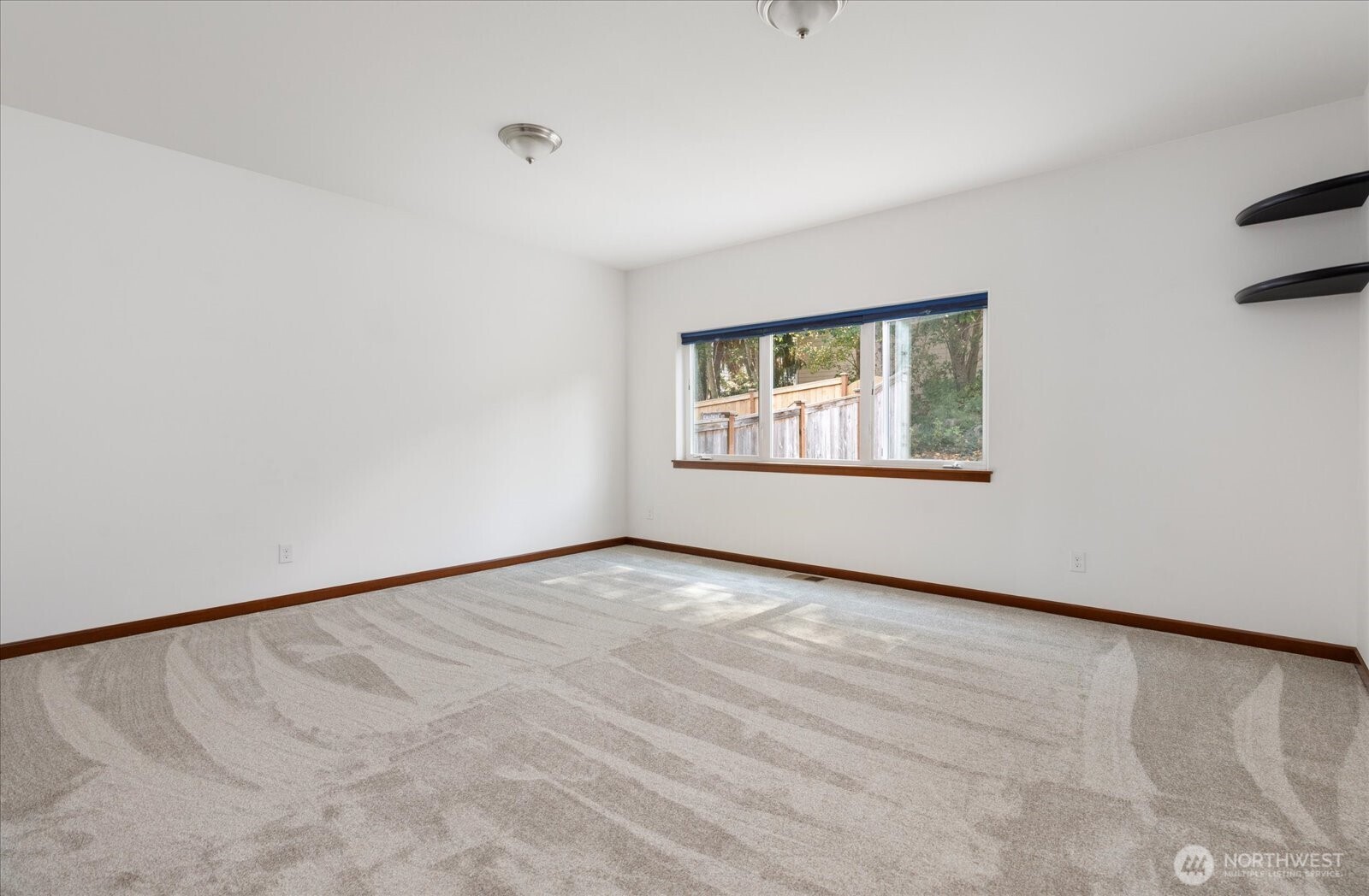 2119 20th Street Anacortes, WA 98221 - Photo 19 of 38 an empty room with windows