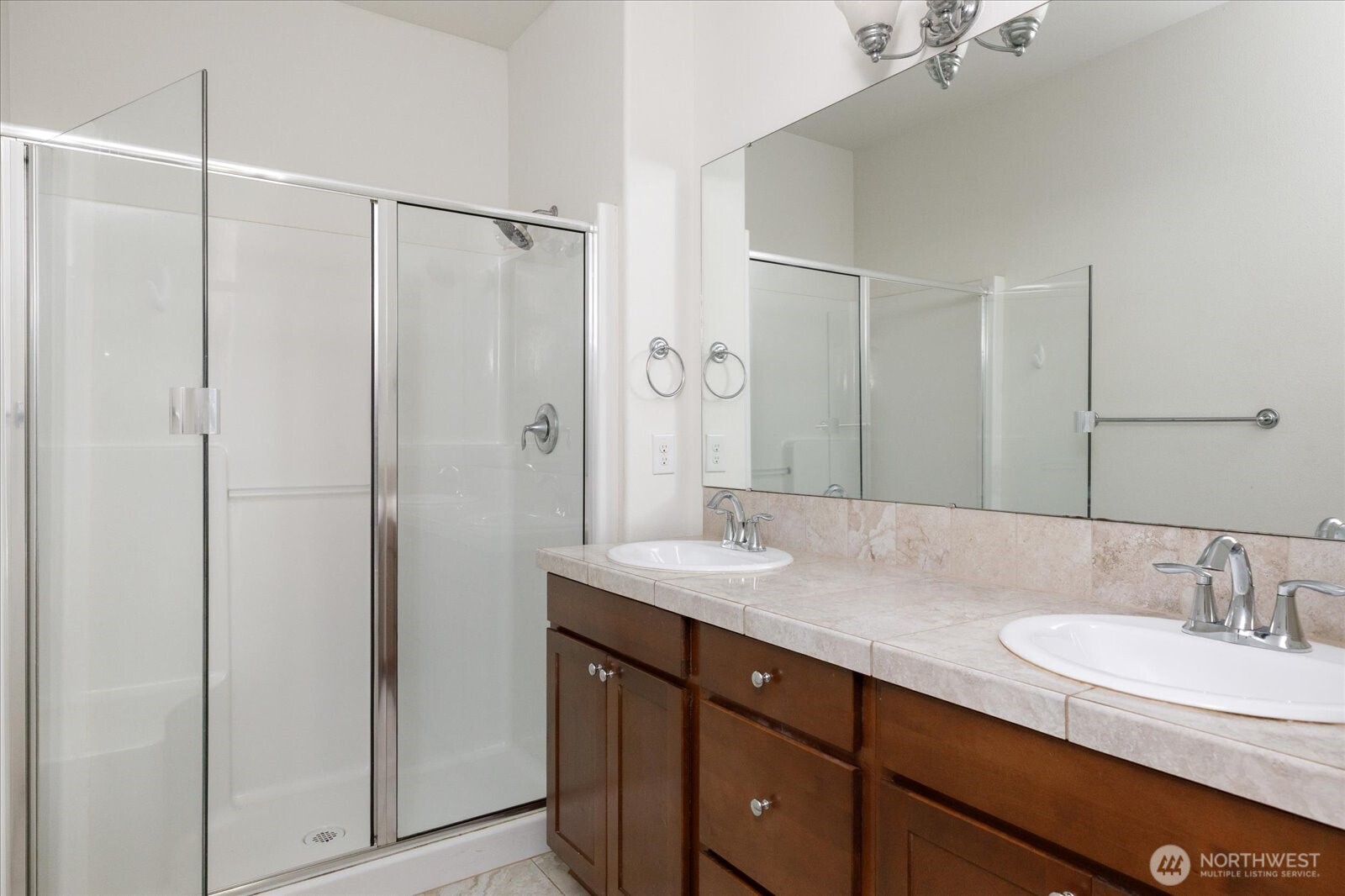 2119 20th Street Anacortes, WA 98221 - Photo 22 of 38 a bathroom with a granite countertop sink mirror and double