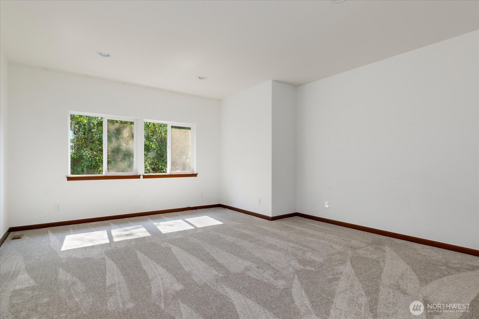 2119 20th Street Anacortes, WA 98221 - Photo 27 of 38 a view of an empty room with a window