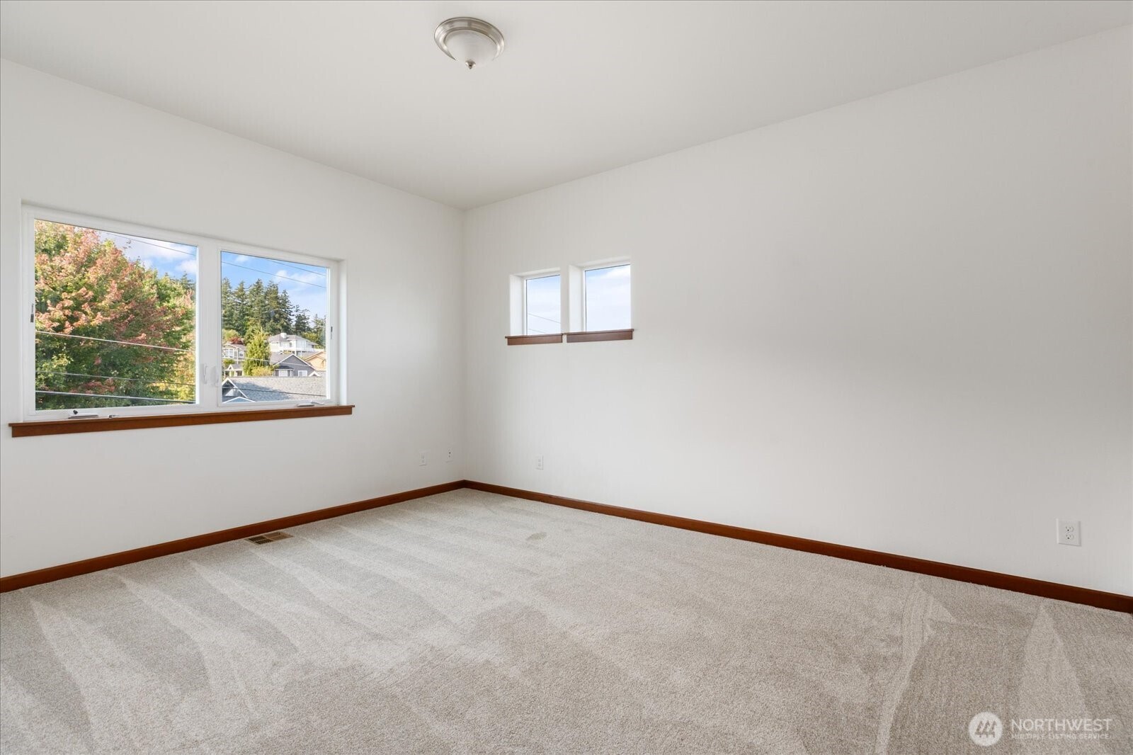 2119 20th Street Anacortes, WA 98221 - Photo 30 of 38 an empty room with windows