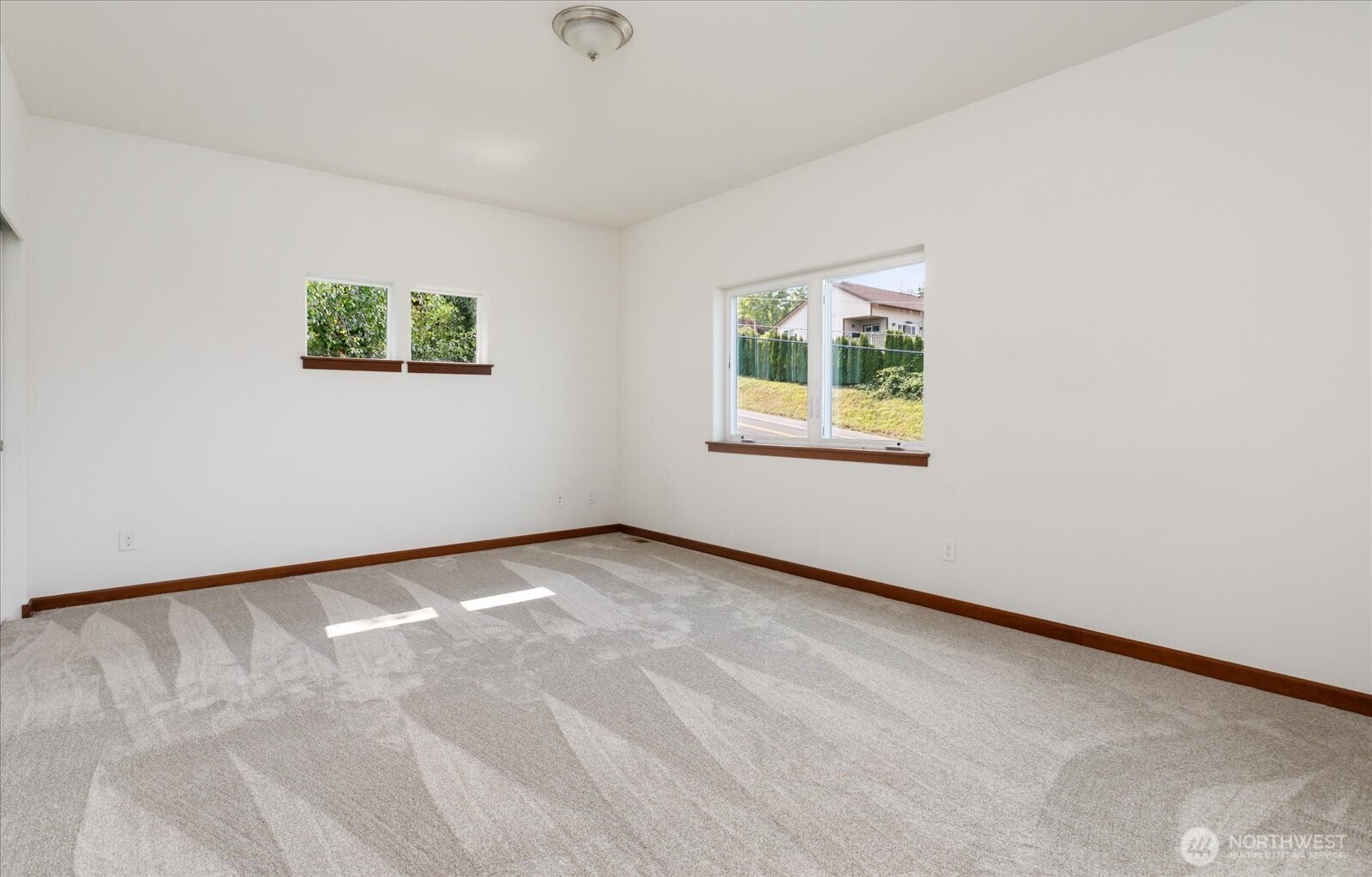 2119 20th Street Anacortes, WA 98221 - Photo 32 of 38 an empty room with a window