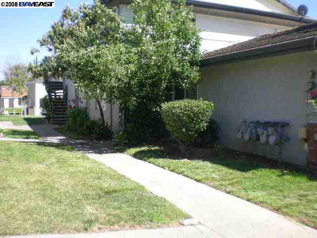 2123 Peppertree Way, Unit 2 Antioch, CA 94509 - Photo 1 of 1 a backyard of a house with lots of green space