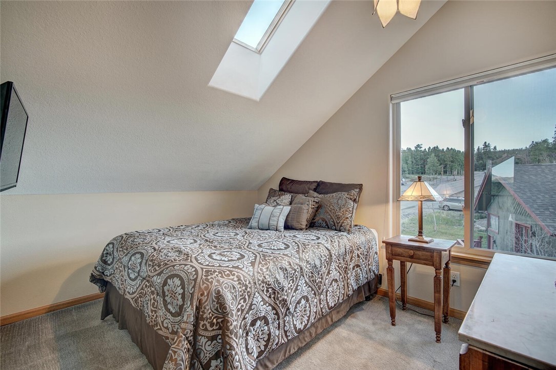 591 Ryan Gulch Road Silverthorne, CO 80498 - Photo 23 of 34 The third bedroom with lots of natural light.