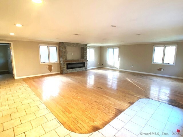 159 Anthony Road Tolland, CT 06084 - Photo 21 of 40 a view of a livingroom with an empty space and a window