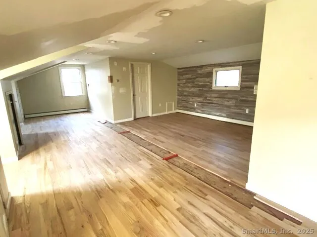 a view of an empty room and window