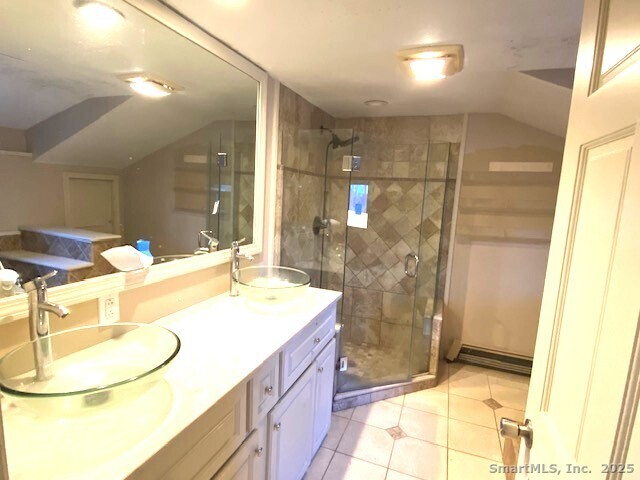 159 Anthony Road Tolland, CT 06084 - Photo 26 of 40 a bathroom with a sink and a mirror