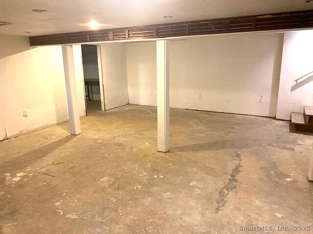 159 Anthony Road Tolland, CT 06084 - Photo 39 of 40 an empty room with a empty space and a window