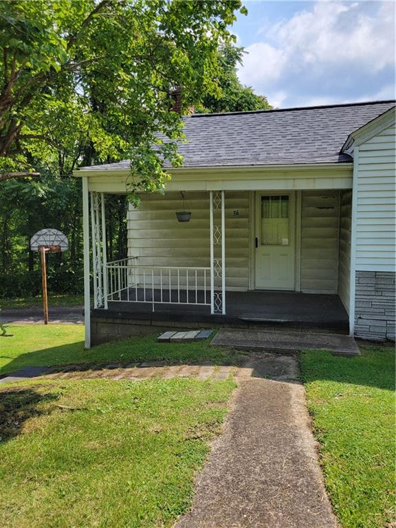 36 Daisytown Road Brownsville, PA 15417 - Photo 3 of 19 a view of a house with backyard and garden