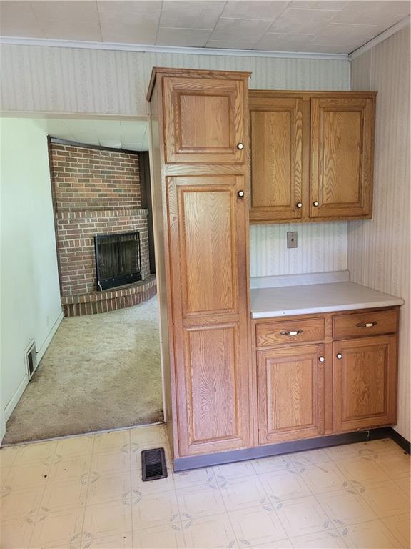 36 Daisytown Road Brownsville, PA 15417 - Photo 7 of 19 a kitchen with granite countertop cabinets and wooden floor
