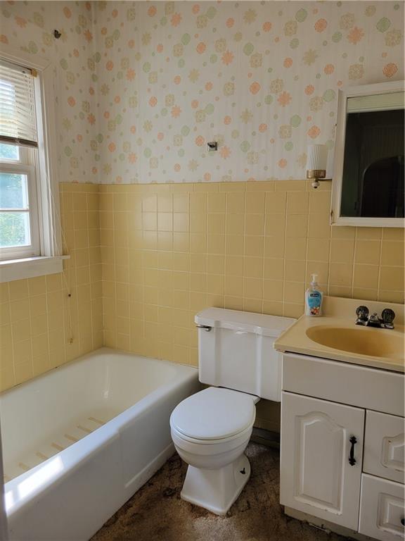 36 Daisytown Road Brownsville, PA 15417 - Photo 10 of 19 a bathroom with a toilet a sink and bathtub