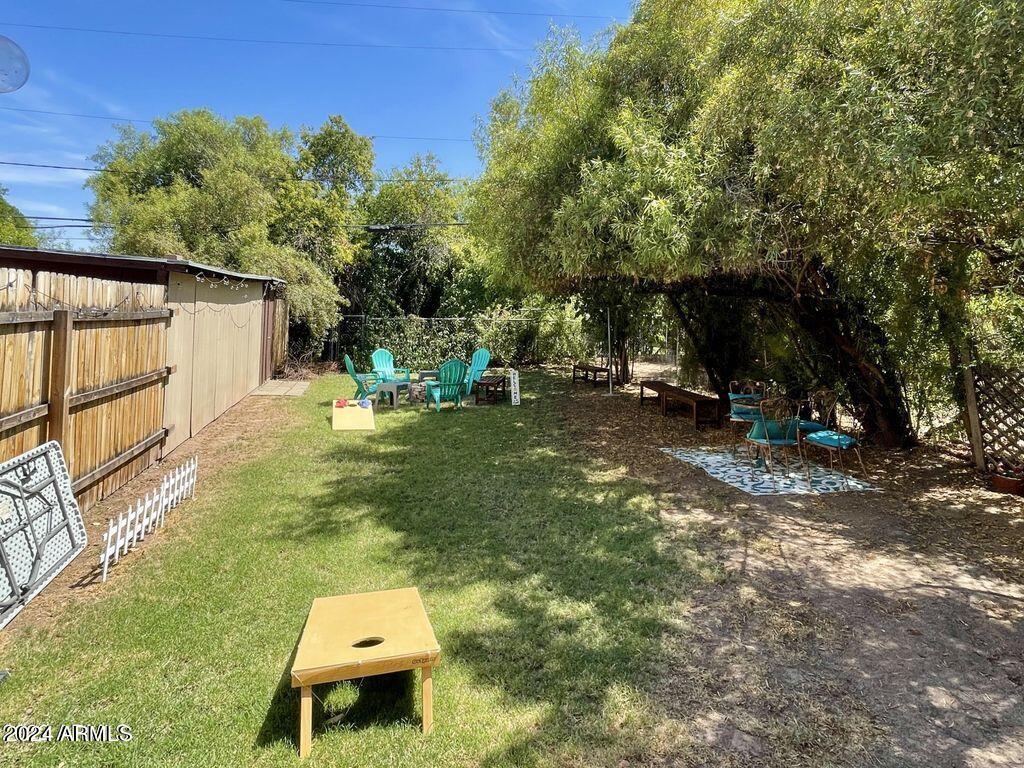 15 East Oregon Avenue, Unit 15 Phoenix, AZ 85012 - Photo 1 of 14 a backyard of a house with seating space