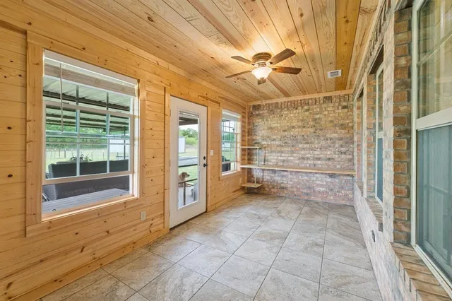 a view of an entryway with a chandelier