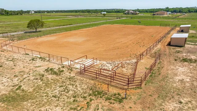 a view of a lake with a yard