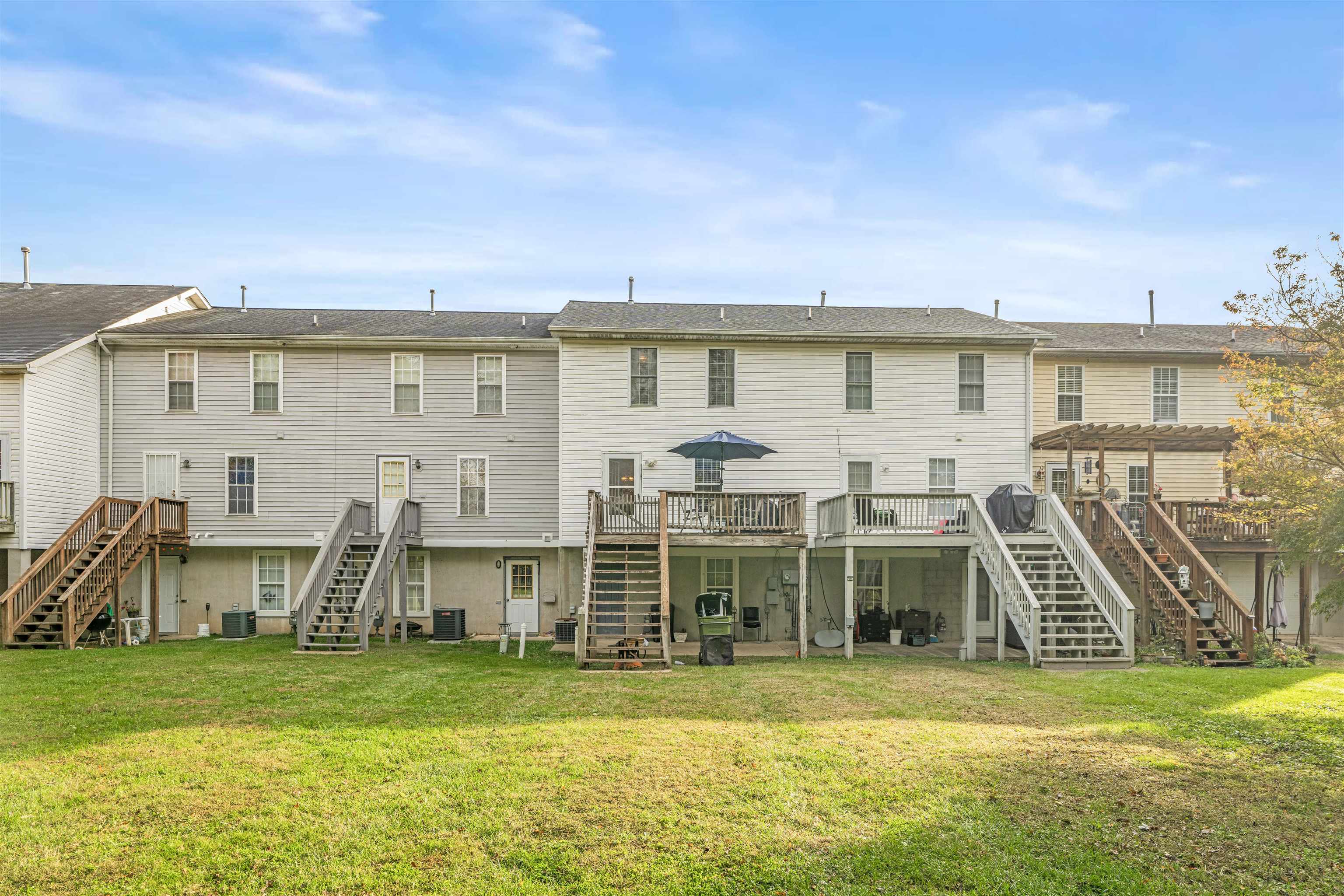 1046 Bridge Avenue Waynesboro, VA 22980 - Photo 22 of 23 a view of a house with a big yard and large trees