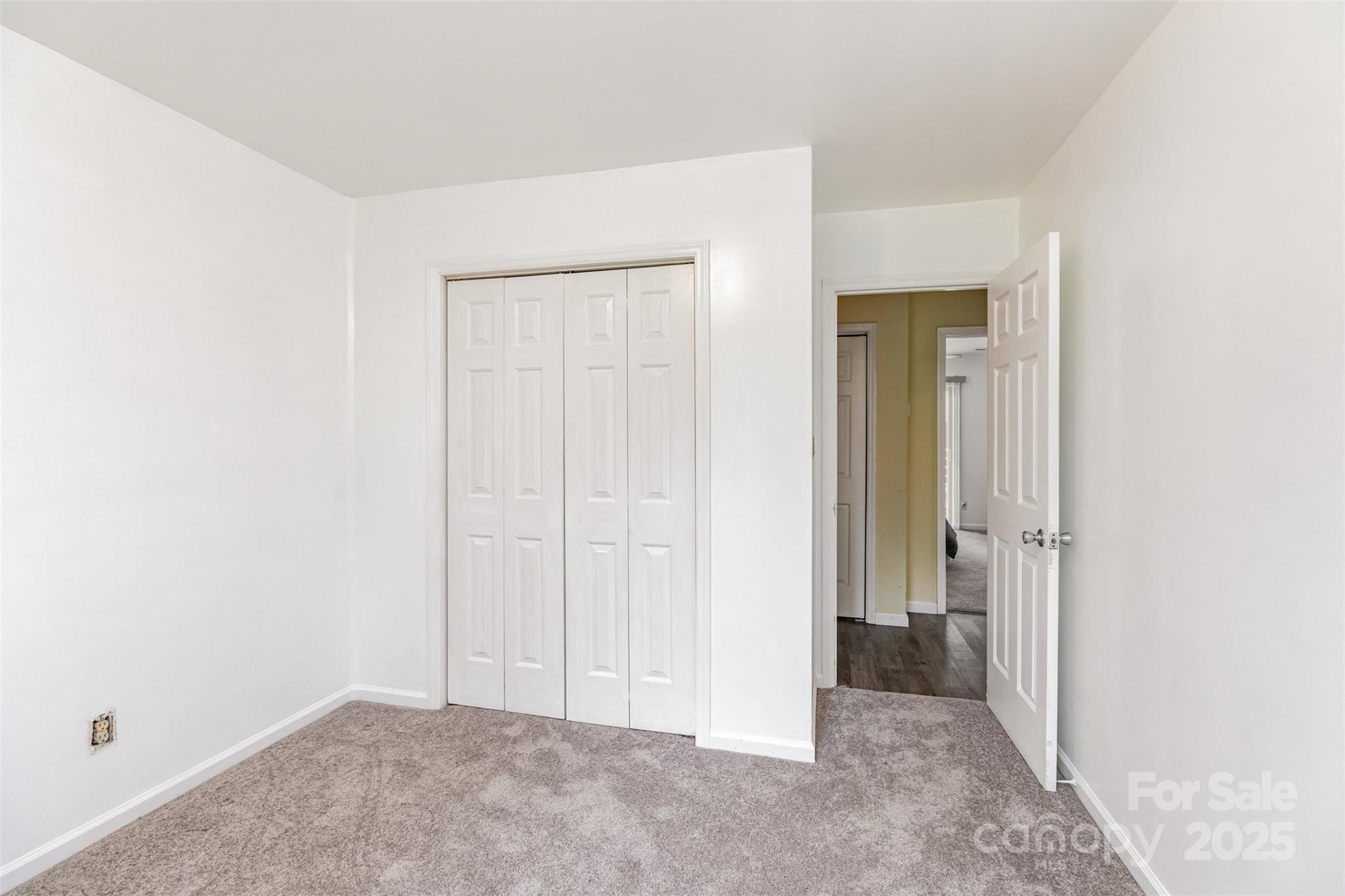 2241 Indian Cross Trail Matthews, NC 28104 - Photo 16 of 46 an empty room with closet