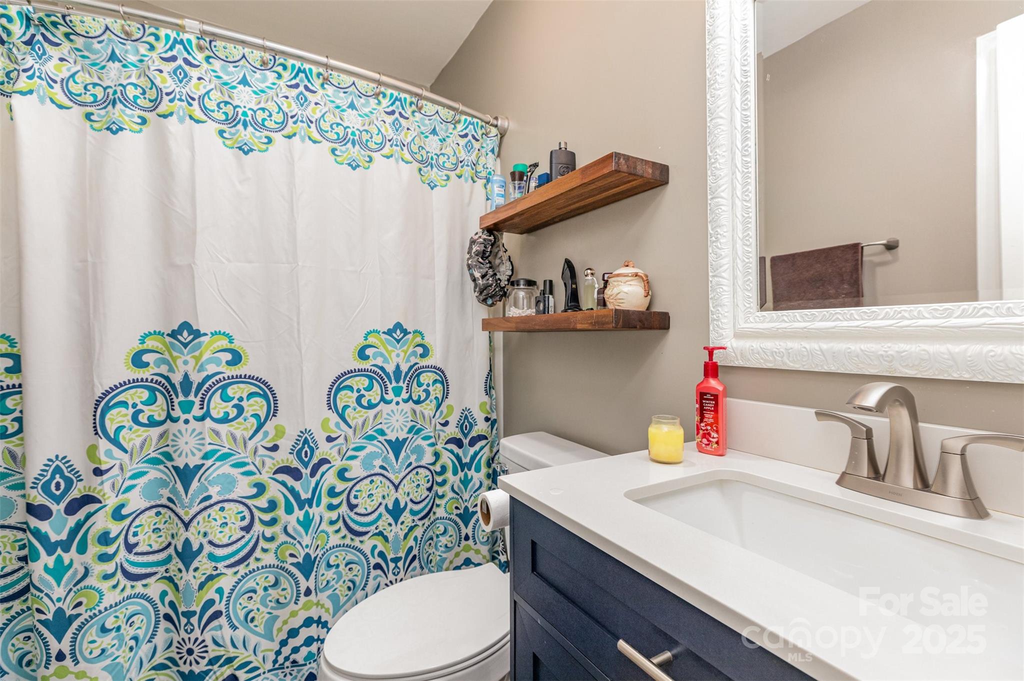 2241 Indian Cross Trail Matthews, NC 28104 - Photo 18 of 46 a bathroom with a sink and a toilet