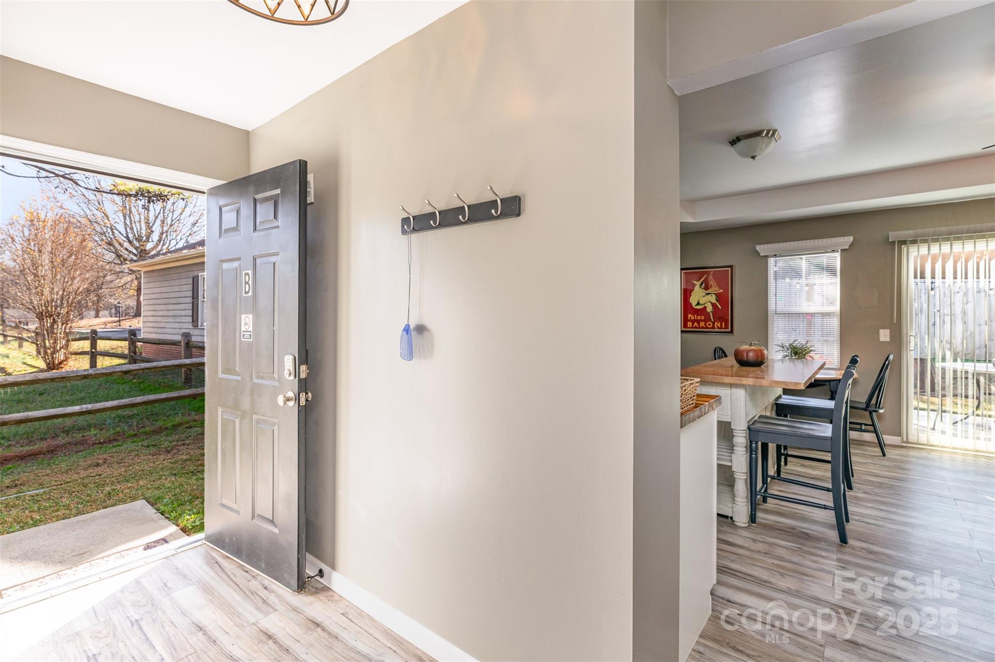 2241 Indian Cross Trail Matthews, NC 28104 - Photo 23 of 46 a view of a livingroom with furniture and front door