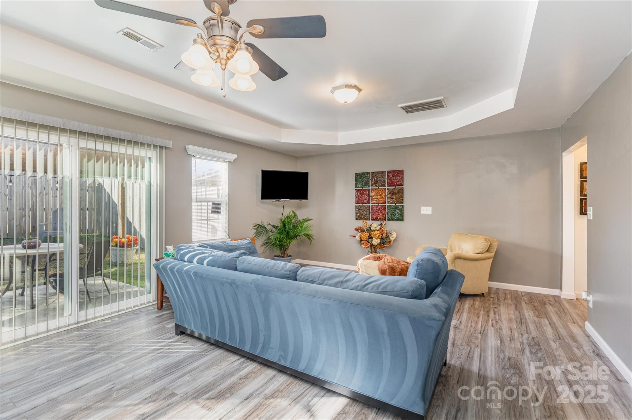 2241 Indian Cross Trail Matthews, NC 28104 - Photo 24 of 46 a living room with furniture and wooden floor