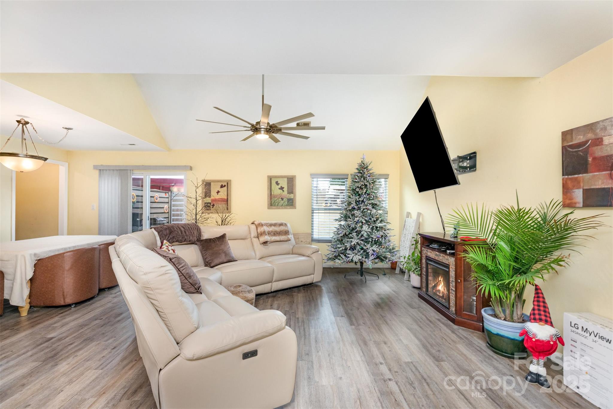 2241 Indian Cross Trail Matthews, NC 28104 - Photo 7 of 46 a living room with furniture and a flat screen tv