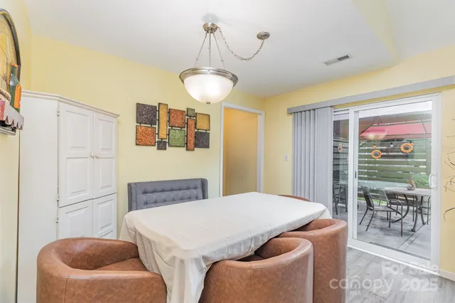 a room with furniture and a chandelier