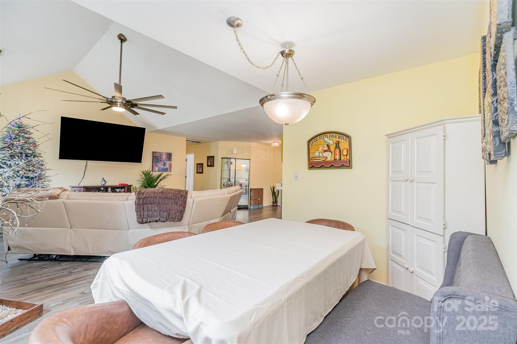 2241 Indian Cross Trail Matthews, NC 28104 - Photo 10 of 46 a spacious bedroom with a bed and a flat screen tv