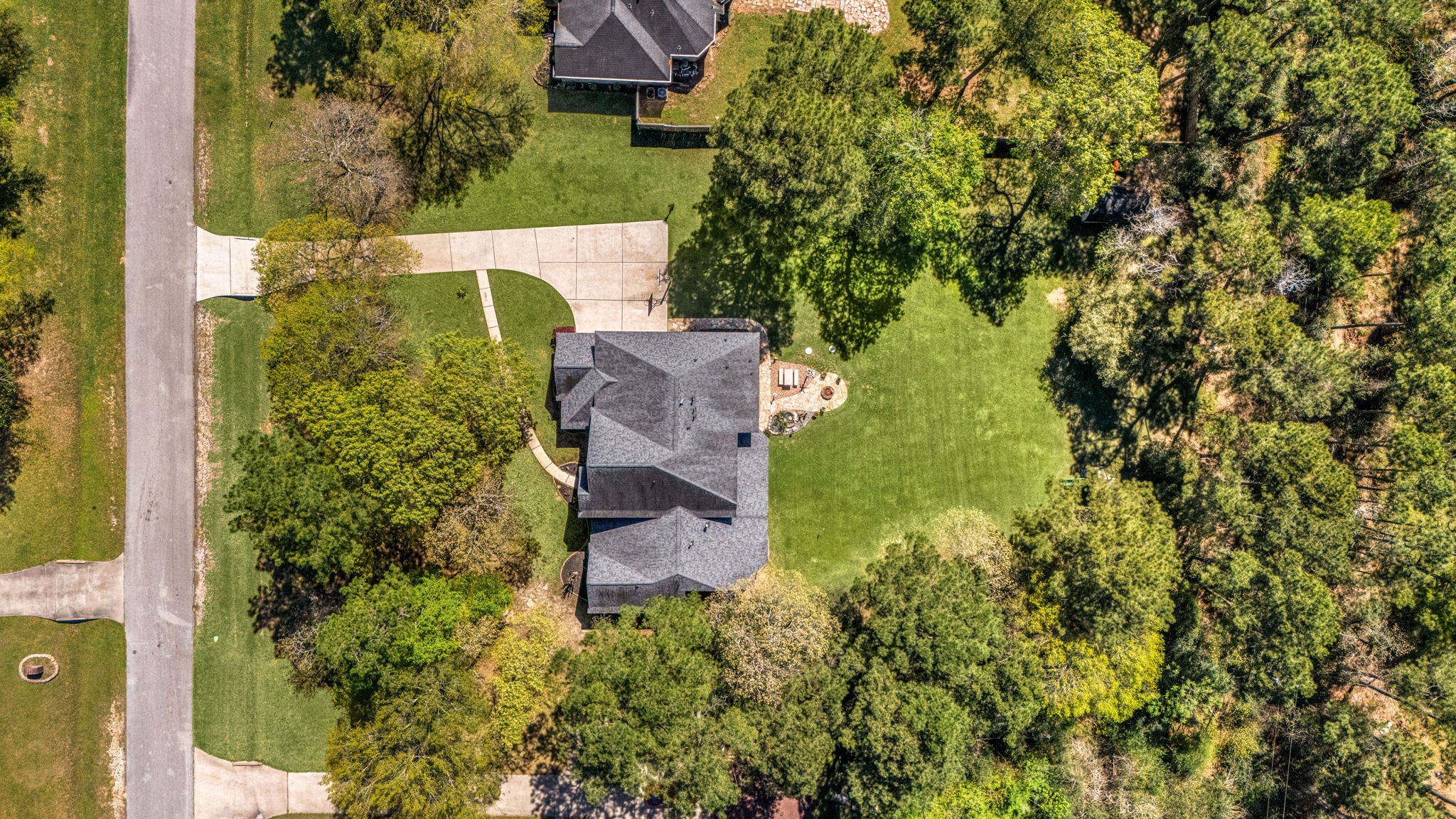 14419 Timbergreen Drive Magnolia, TX 77355 - Photo 35 of 43 Aerial view showing the expansive lot surrounded by mature trees, offering privacy, space, and a beautiful natural setting.
