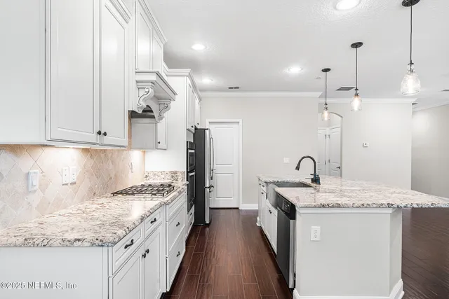 a view of tennis court with trees in the background