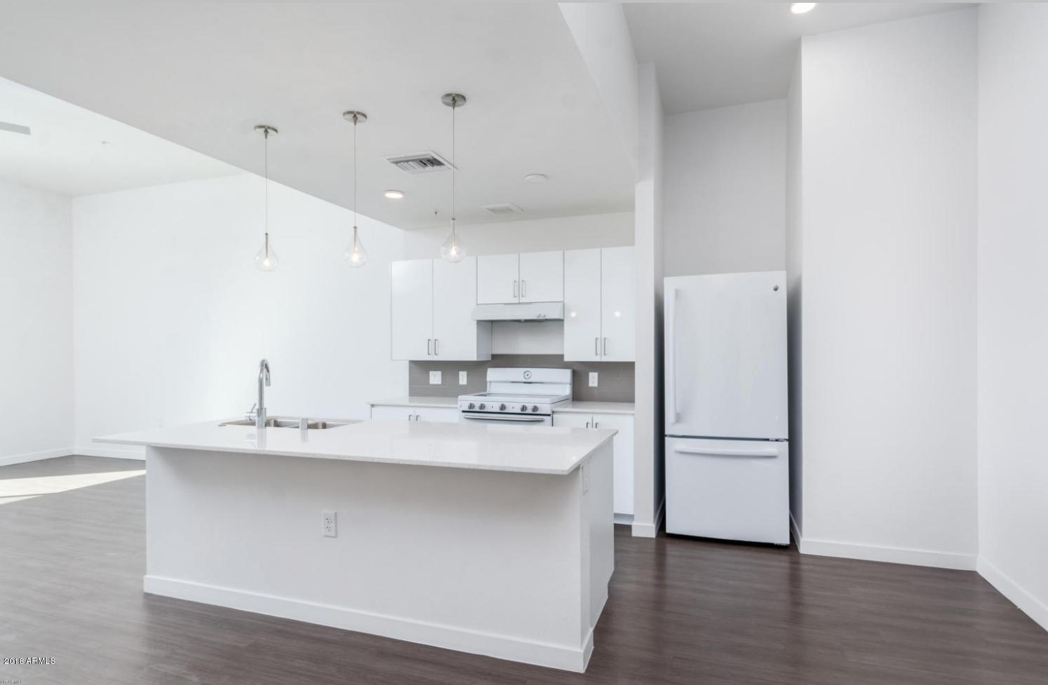 1130 North 2nd Street, Unit 310 Phoenix, AZ 85004 - Photo 3 of 20 KITCHEN AND LIVING ROOM